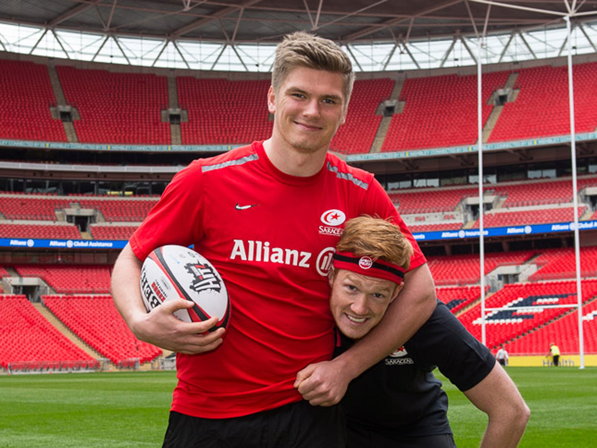 Greg Rutherford (right) poses with Owen Farrell (left). Rutherford takes on the Catch-a-Million challenge for Sport Relief at half time during Saracens v Harlequins at Wembley on March 22nd. The match kicks off at 3pm and is exclusively live on BT Sport