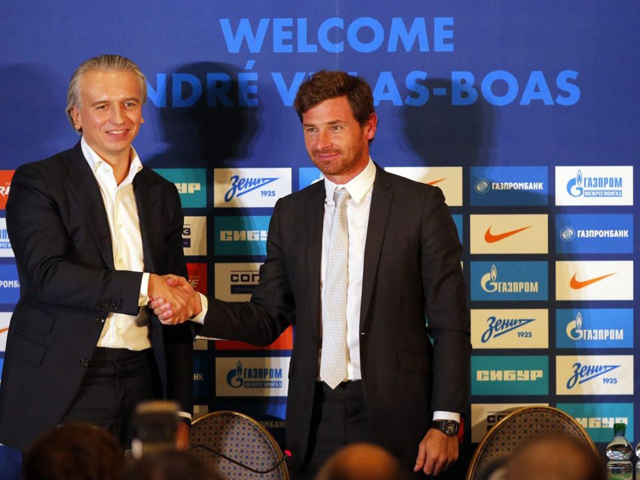 Petersburg's new Portuguese head coach Andre Villas-Boas (right) shakes hands with Zenit President Alexander Dukov