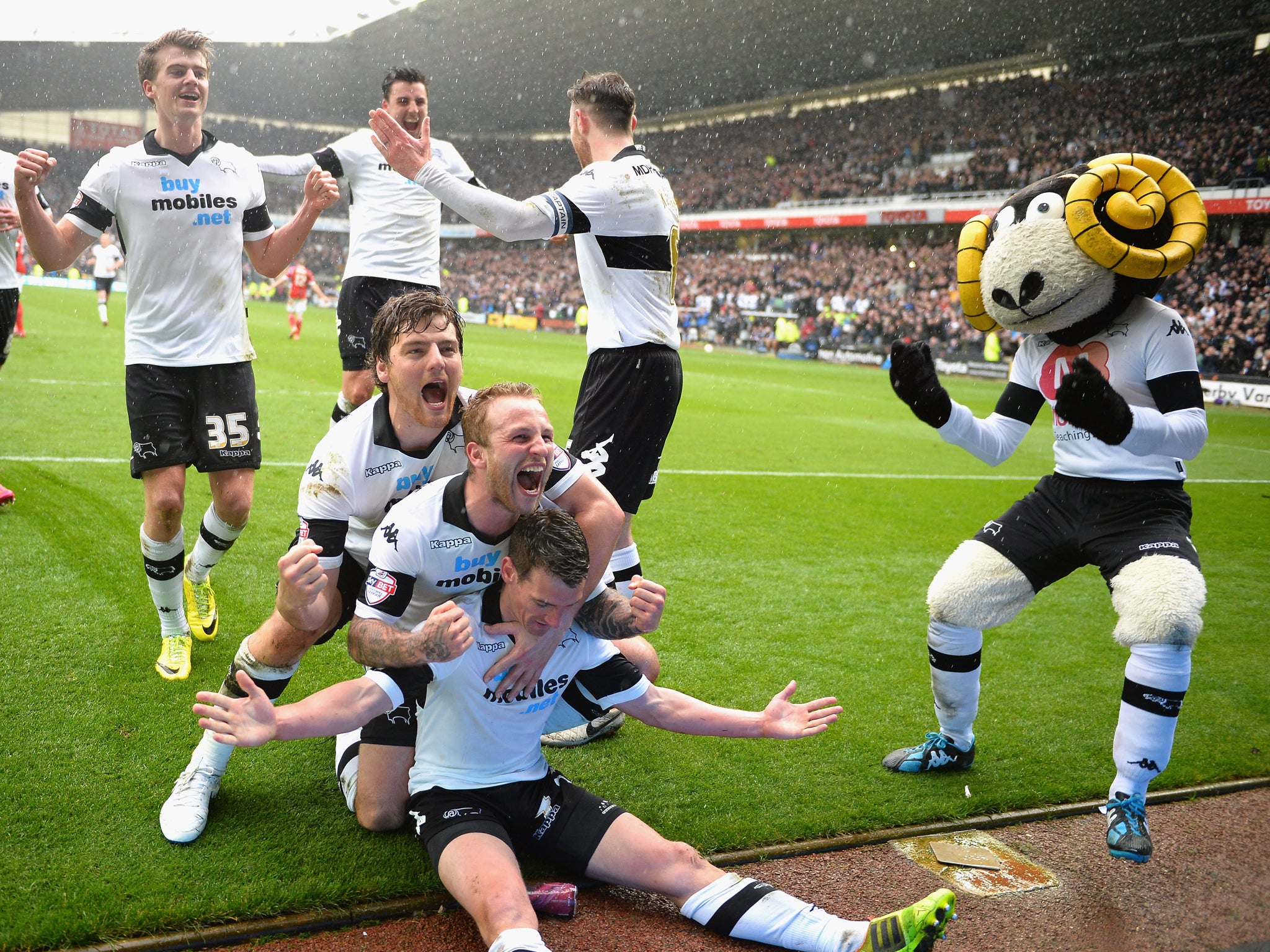 Derby County players celebrate Craig Bryson's hat-trick in the 5-0 win over Nottingham Forest