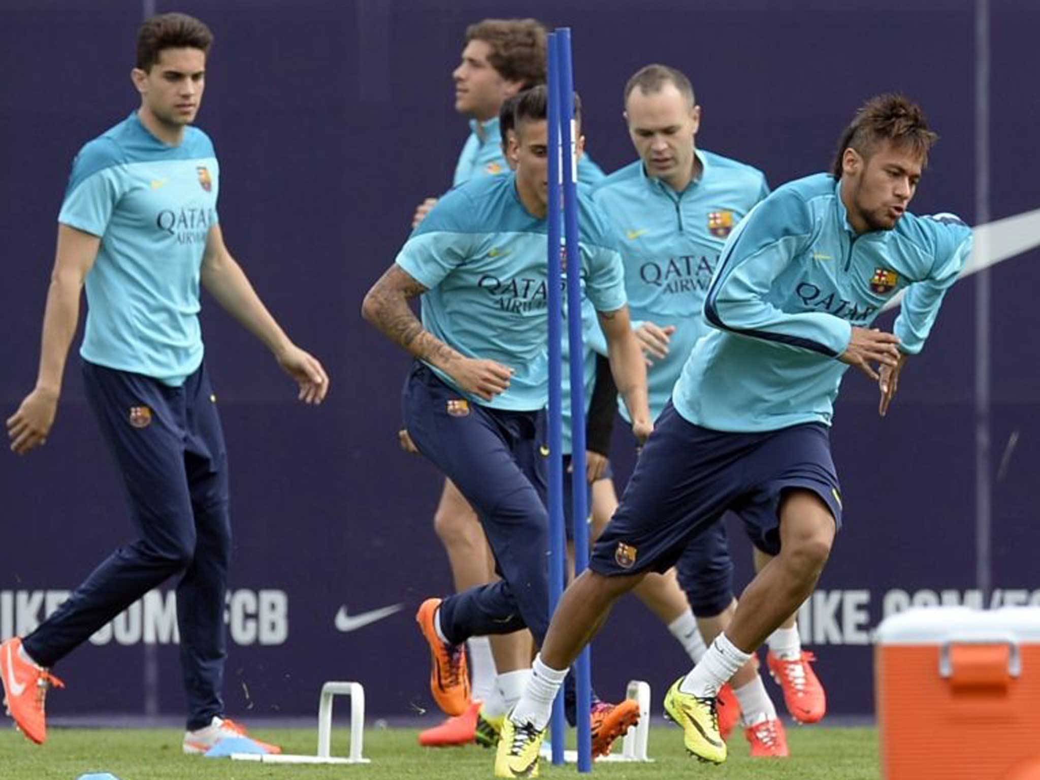 Training camp: Neymar (right) exercises with Barcelona team-mates ahead of today’s Clasico against Real Madrid