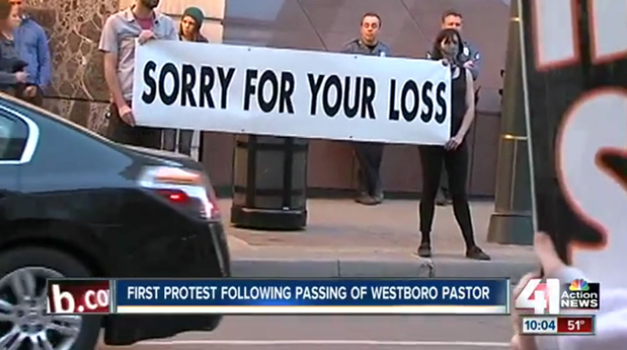 The Westboro Baptist Church was met with this banner on its first protest since the death of founder Fred Phelps