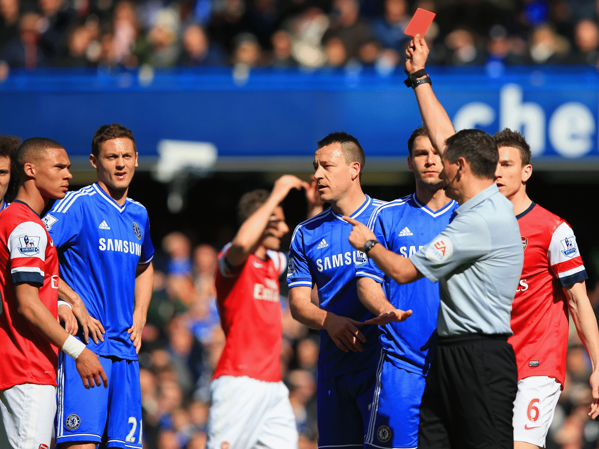 Kieran Gibbs is mistakenly dismissed by referee Andre Marriner in Arsenal's 6-0 defeat to Chelsea