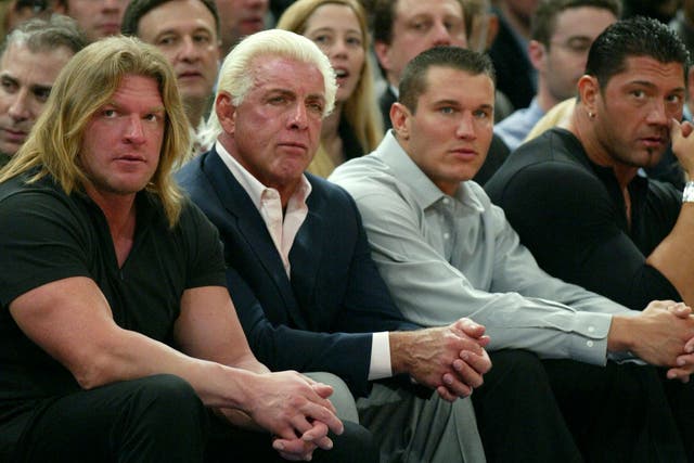 Evolution - Triple H, Ric Flair, Randy Orton and Batista pictured in 2004