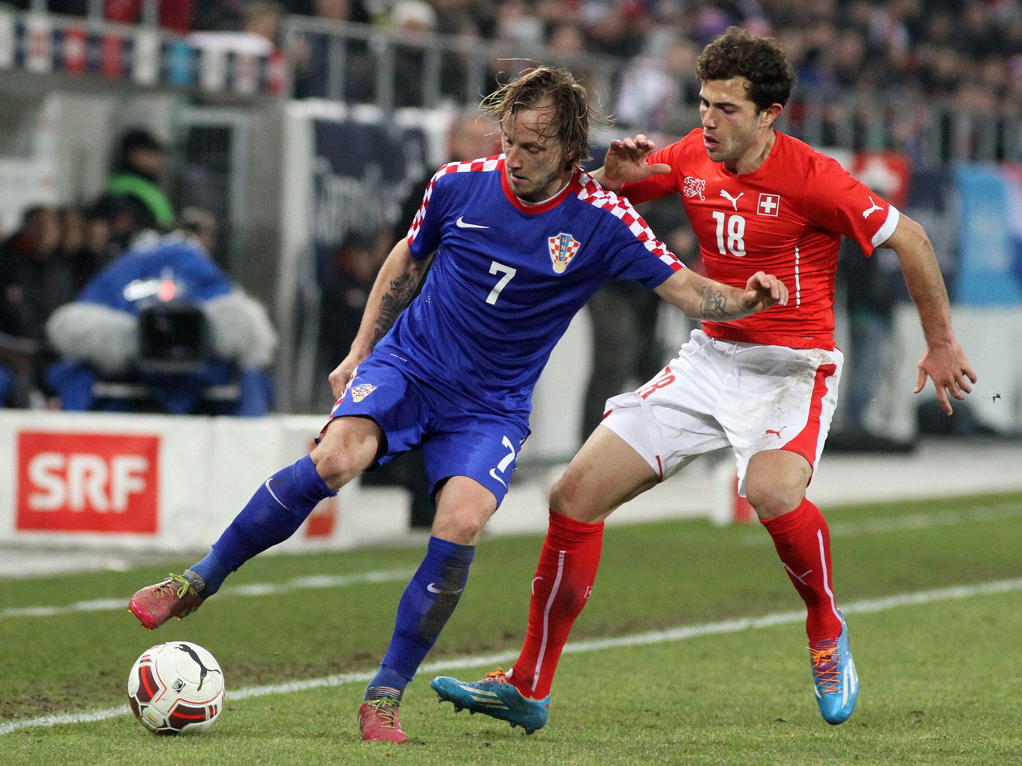 Ivan Rakitic of Croatia in action against Switzerland