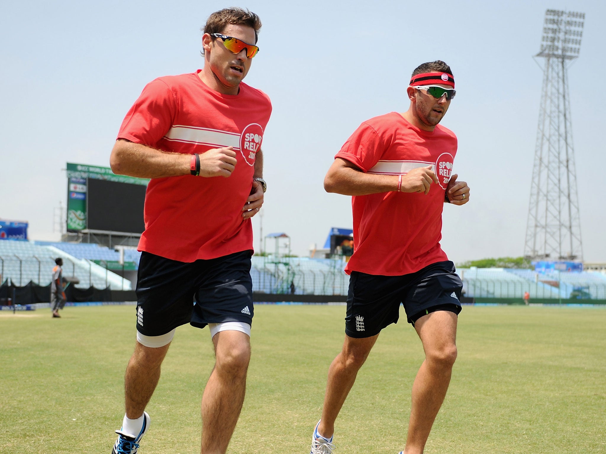 Tim Bresnan and Michael Lumb of England take part in the Sport Relief mile at Zahur Ahmed Chowdhury Stadium on Sunday in Chittagong
