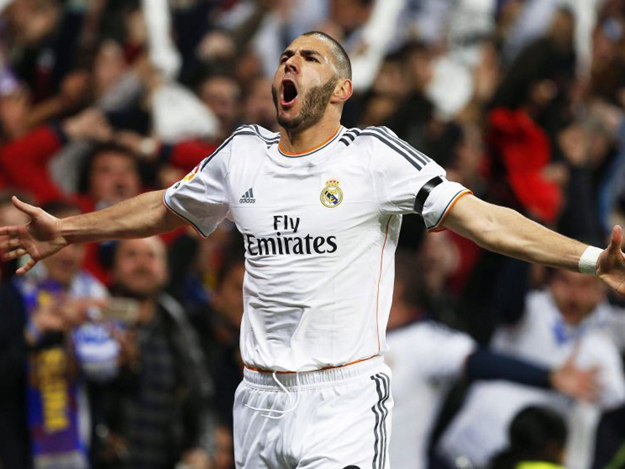 Karim Benzema celebrates his first goal of the game for Real Madrid