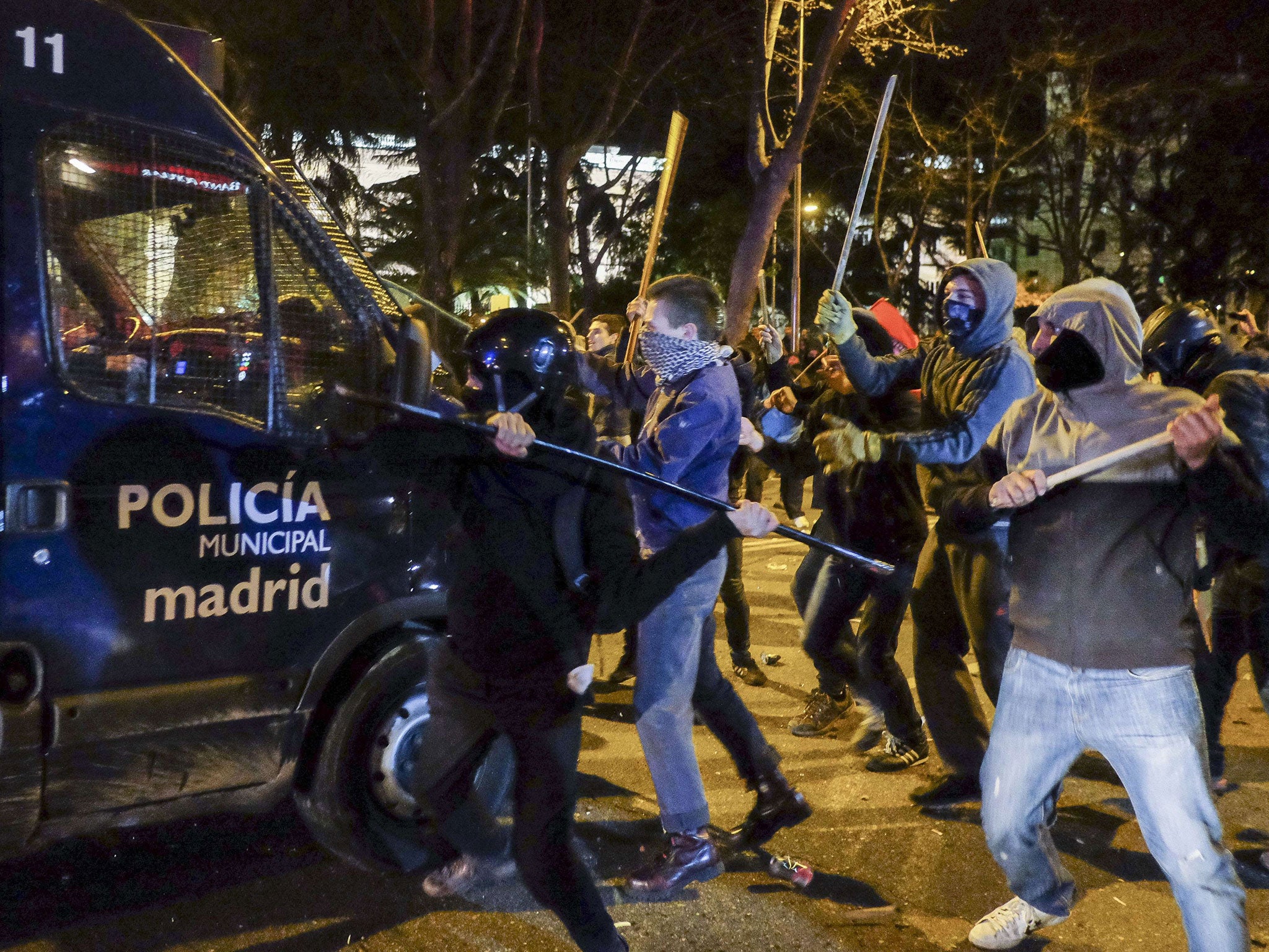 Rioters were stopped from reaching the headquarters of Spain’s ruling party