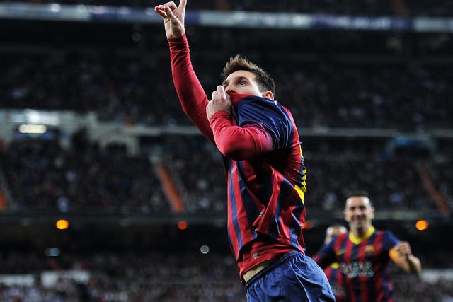 Lionel Messi celebrates after scoring at the Bernabeu