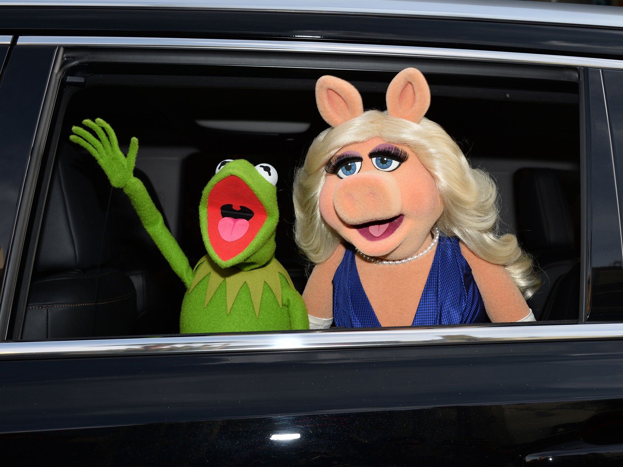 Kermit the Frog and Miss Piggy arrive for the premiere of Disney's 'Muppets Most Wanted'