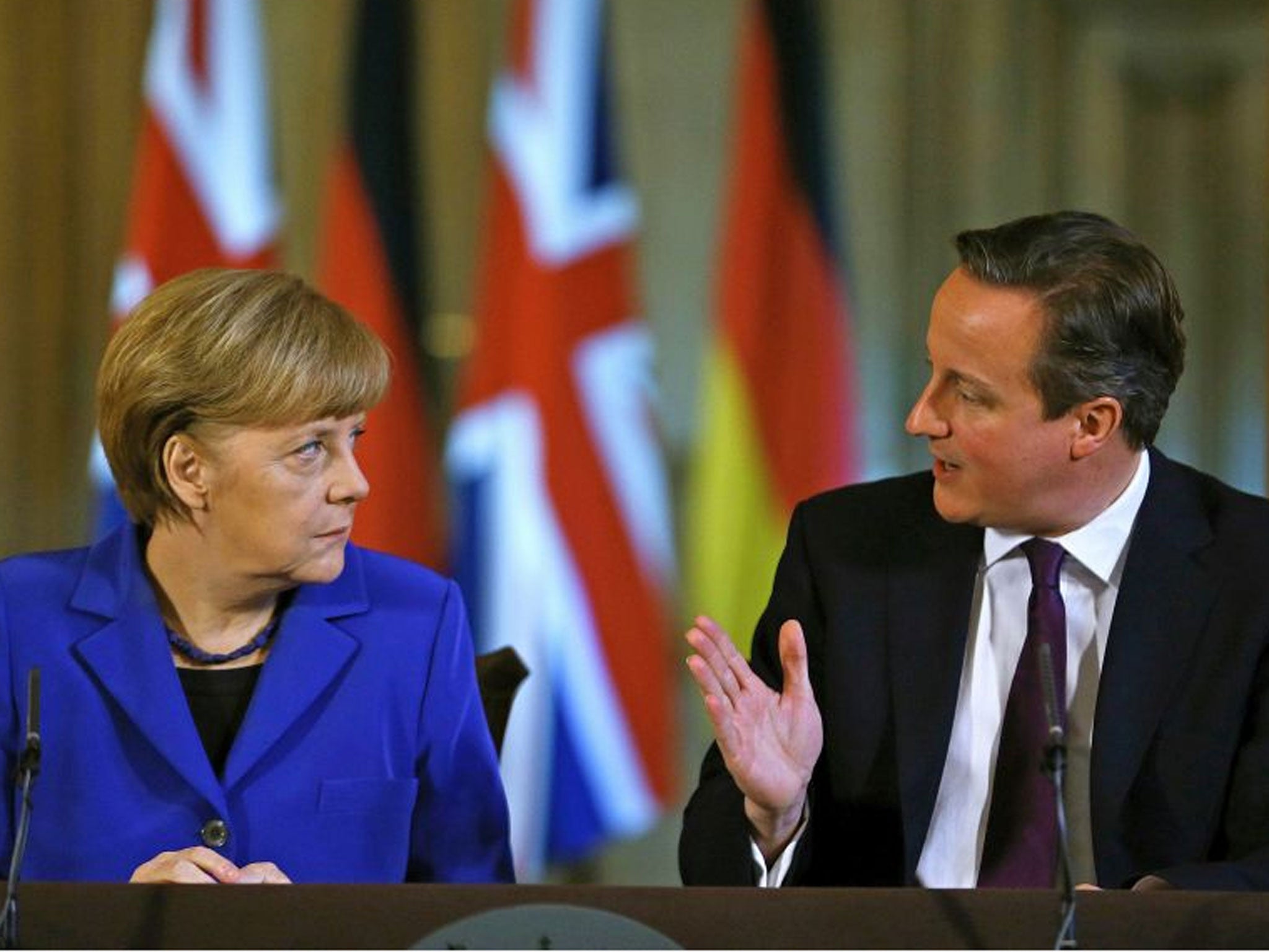 German Chancellor Angela Merkel (L) and Britain's Prime Minister David Cameron address a news conference at 10 Downing Street in London, on February 27, 2014