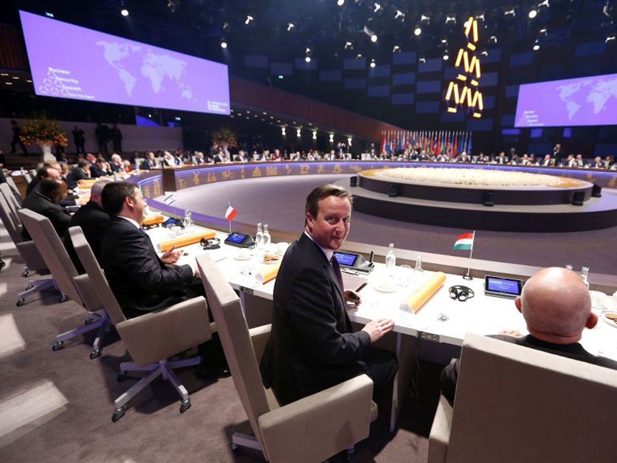David Cameron in the plenary room at the Nuclear Security Summit 2014, where female catering staff are not setting foot.