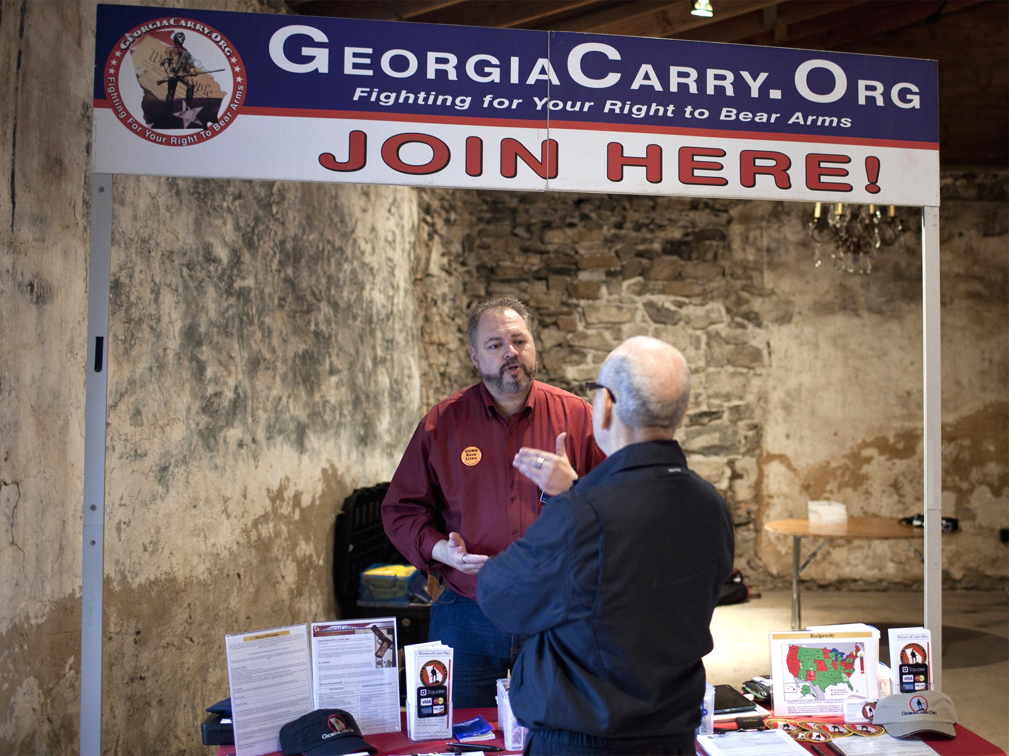 A member of the pro-gun group Georgia Carry puts forward his views at a Republican Party meeting in the state (Getty)