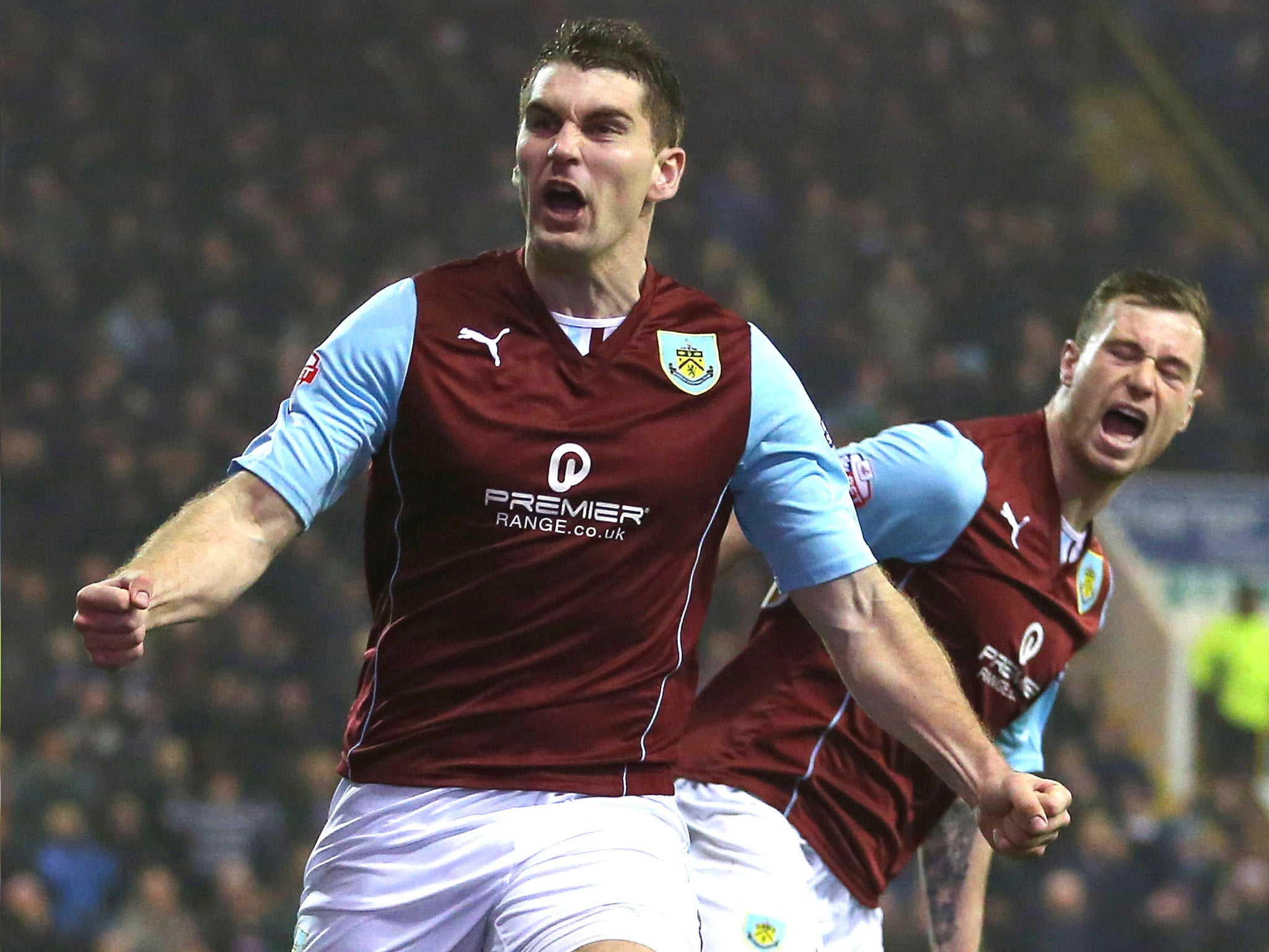 Sam Vokes sent second-place Burnley on their way to victory with his 21st goal of the season