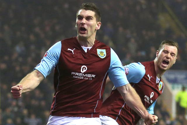 Sam Vokes sent second-place Burnley on their way to victory with his 21st goal of the season