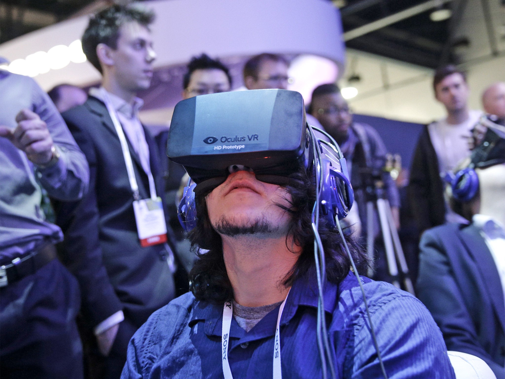 A man tries out a Oculus Rift virtual reality headset at the International Consumer Electronics Show (CES) in Las Vegas earlier this year