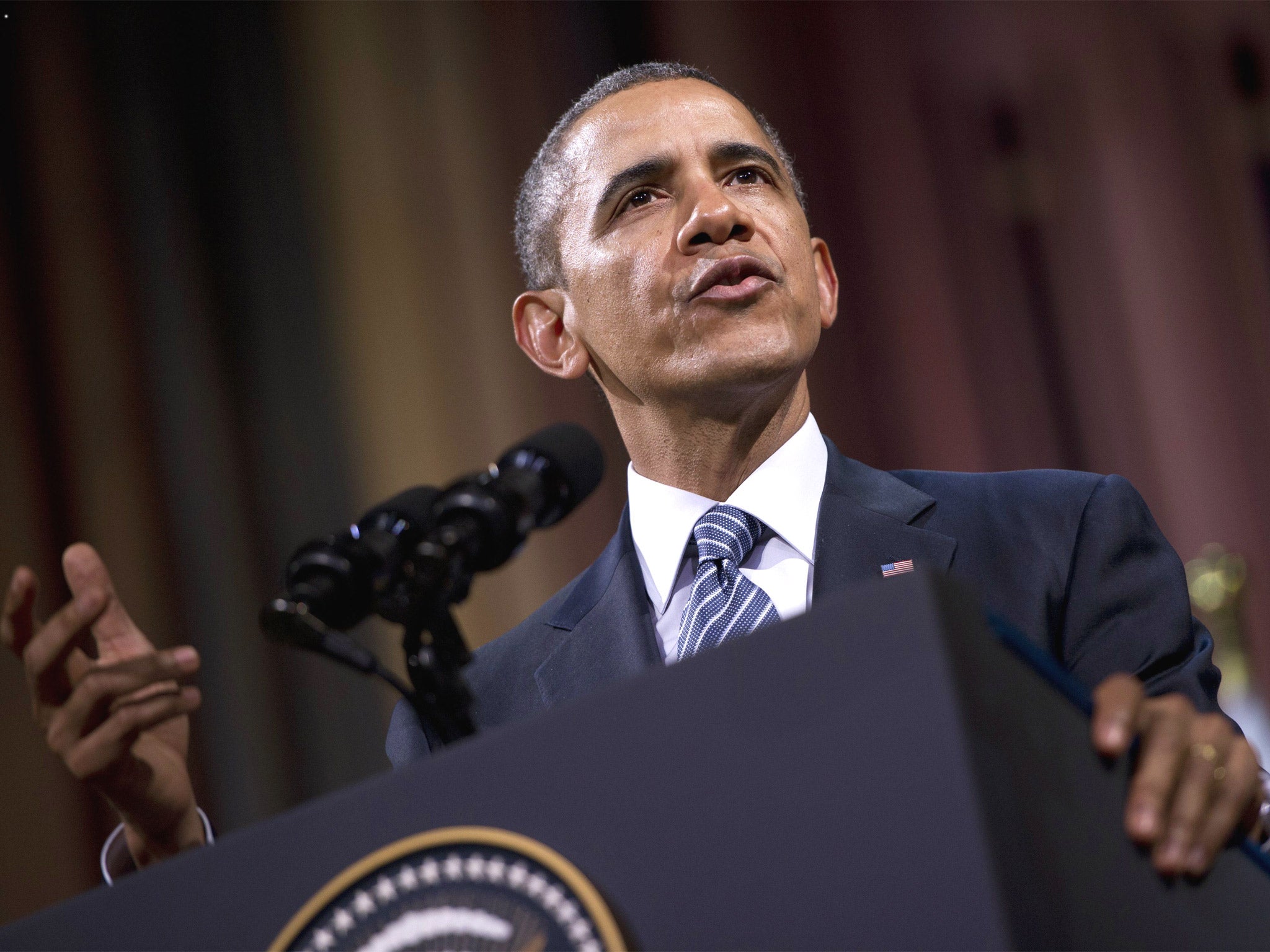 US President Barack Obama delivers a speech at the Palais des Beaux-Arts in Brussels