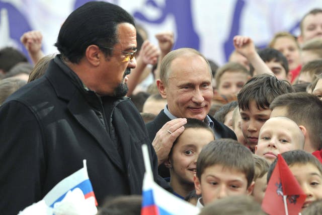 Seagal pictured with Vladimir Putin at a Moscow martial arts school last year