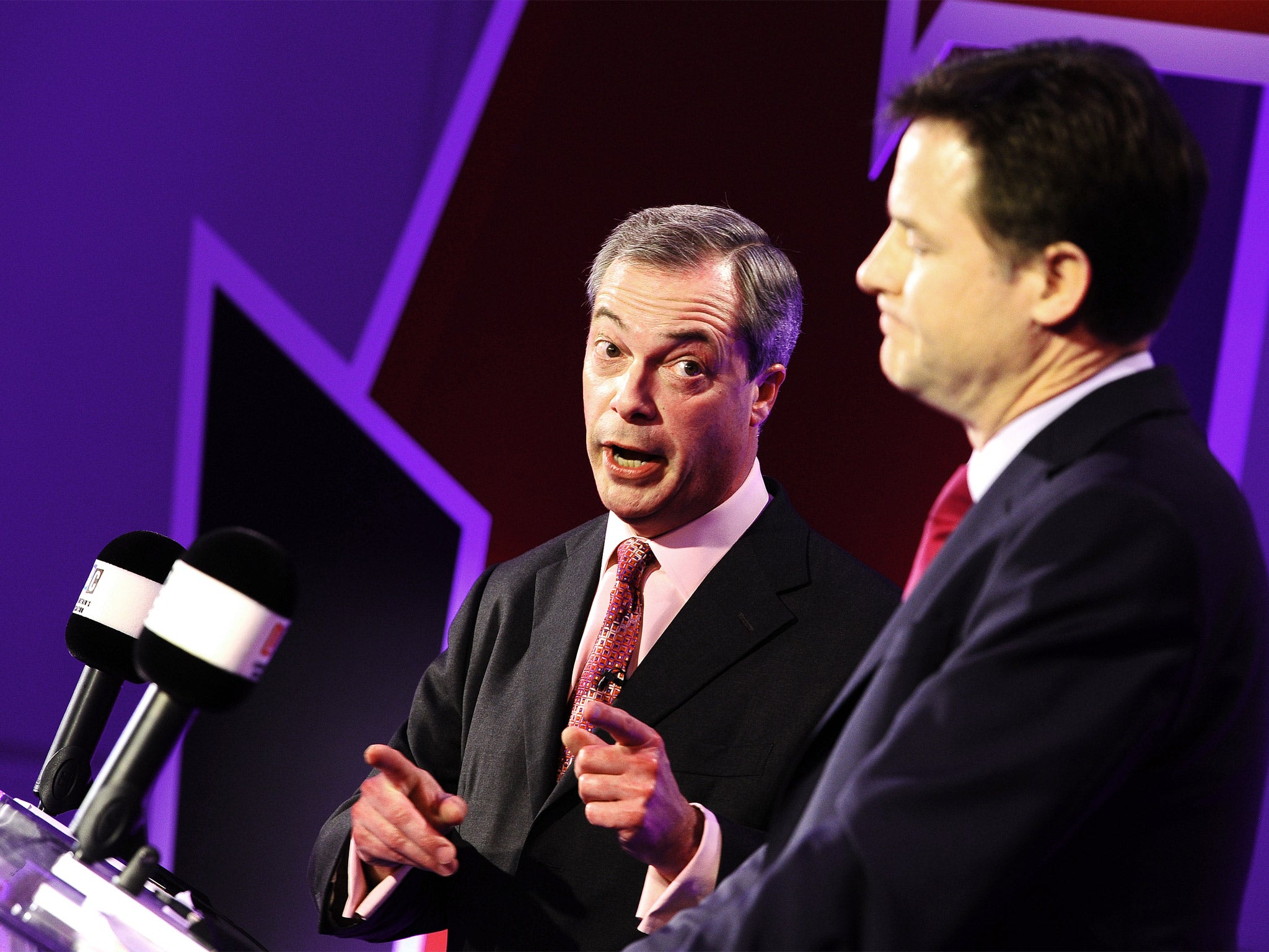Nigel Farage and Nick Clegg take part in a debate over Britain's future in the European Union