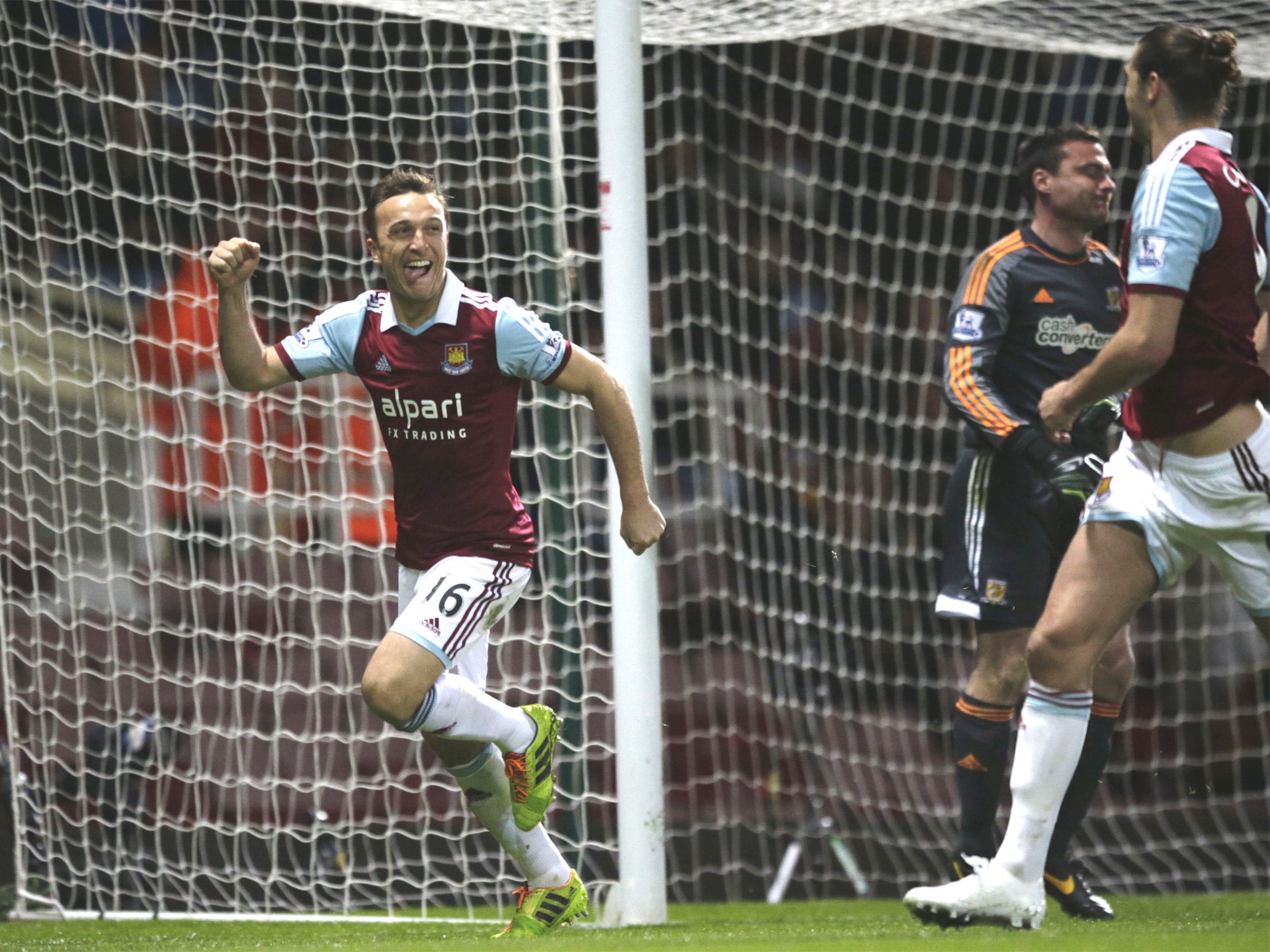 Mark Noble celebrates after demonstrating his trademark coolness from the penalty spot