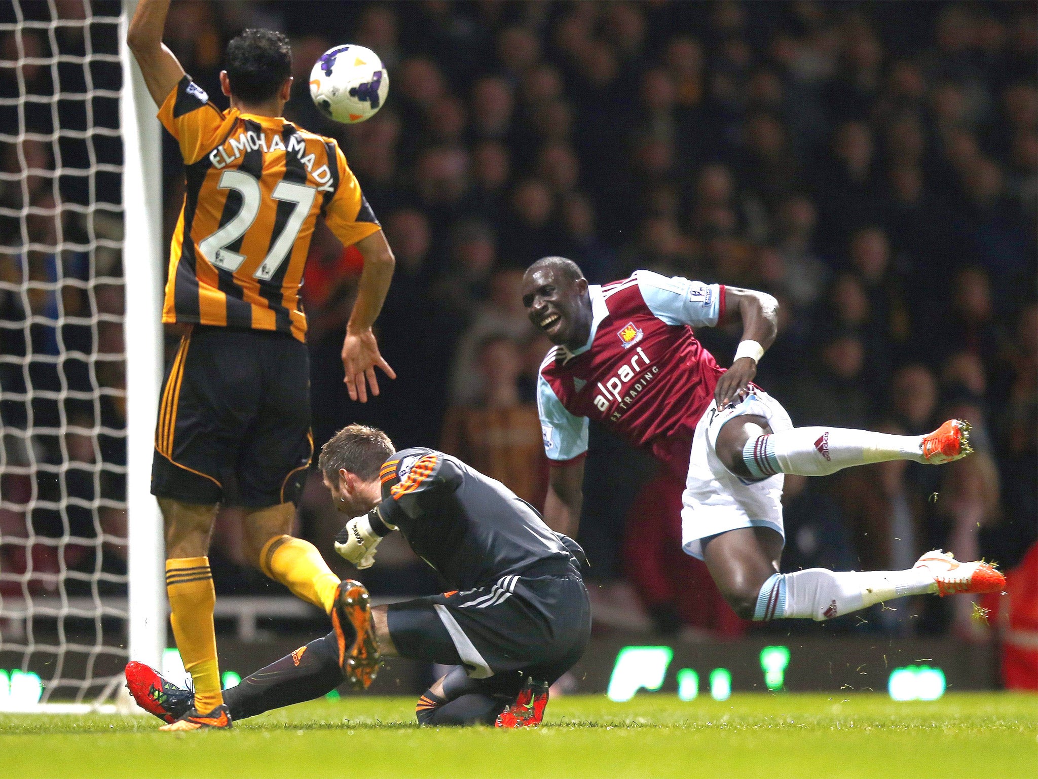 Mohamed Diamé is fouled by Hull keeper Allan McGregor, who was sent off
