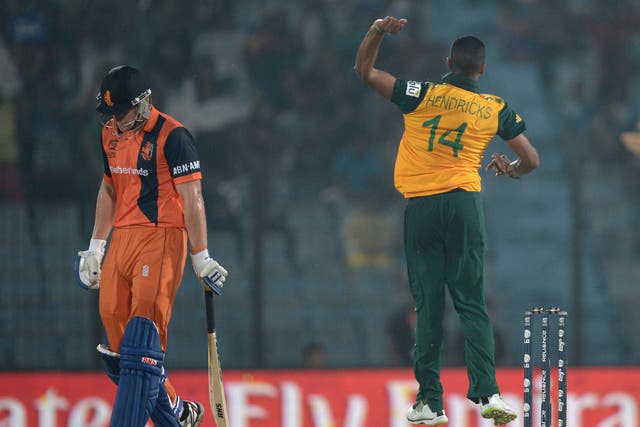 Timm van der Gugten of the Netherlands is dismissed by Beuran Hendricks of South Africa during the ICC World Twenty20