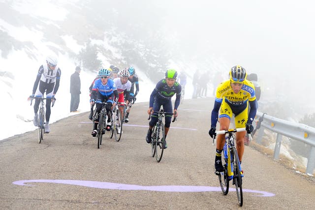 Spain’s Alberto Contador (right) breaks away from the lead group chased by Nairo Quintana, of Colombia, as they head up Vallter 2000 yesterday