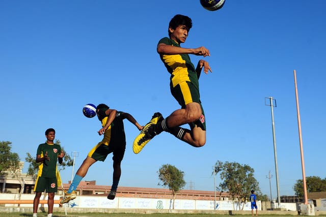 Young players practise ahead of the Street Child World Cup in Rio