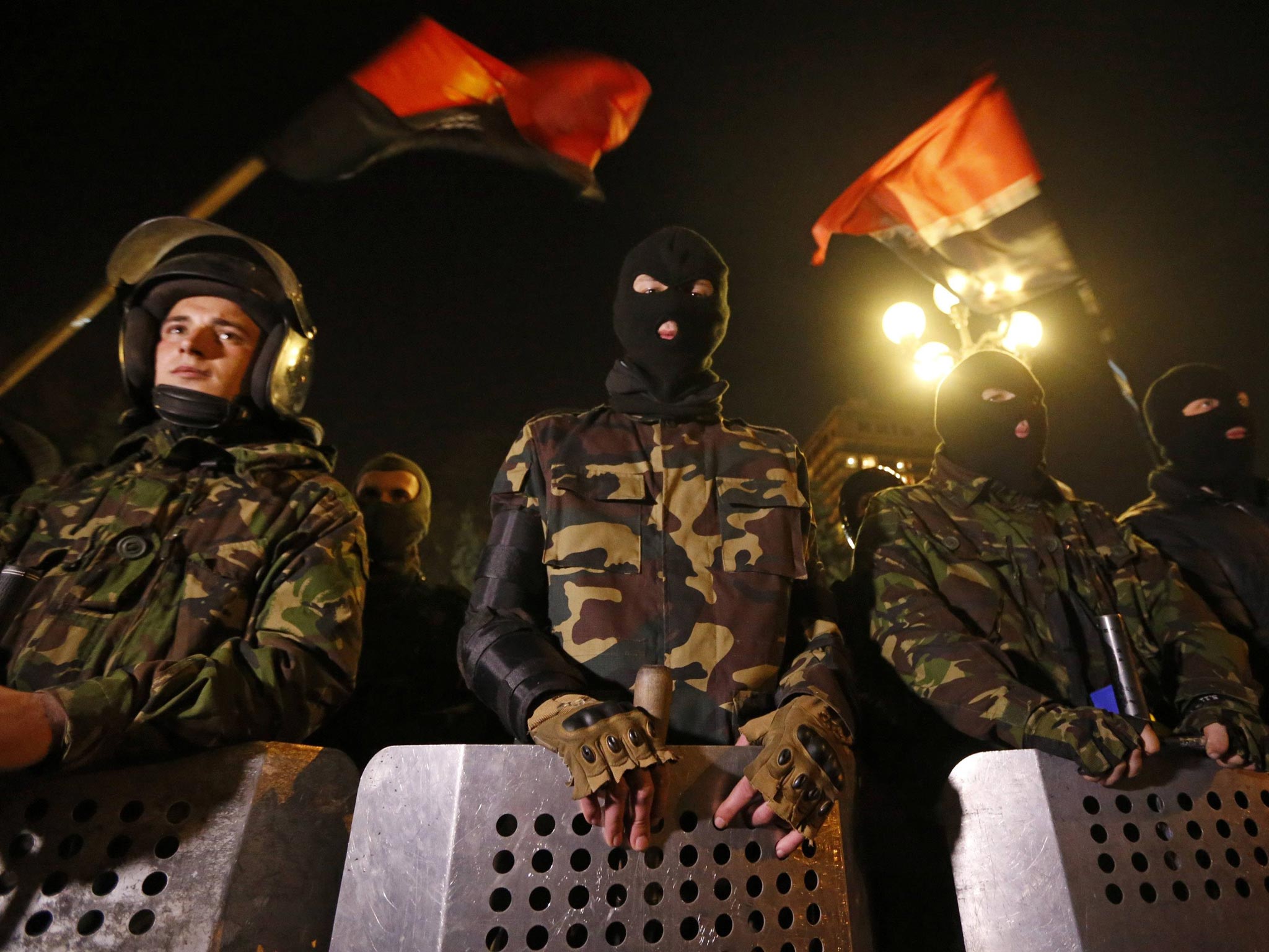 Activists of the Right Sector movement and their supporters gather outside the parliament building to demand the immediate resignation of Internal Affairs Minister Arsen Avakov