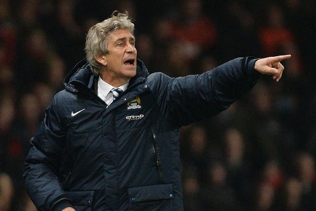 Manuel Pellegrini makes a point from the touchline
