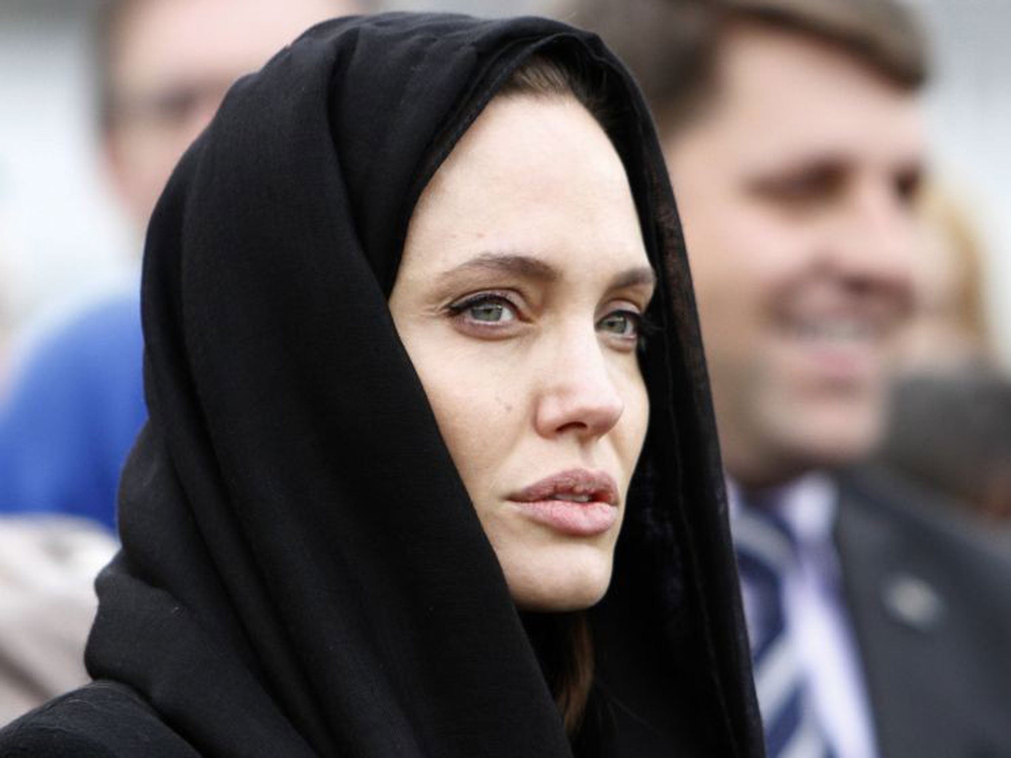 Angelina Jolie appeared sombre as she listened to victims in the town of Srebrenica