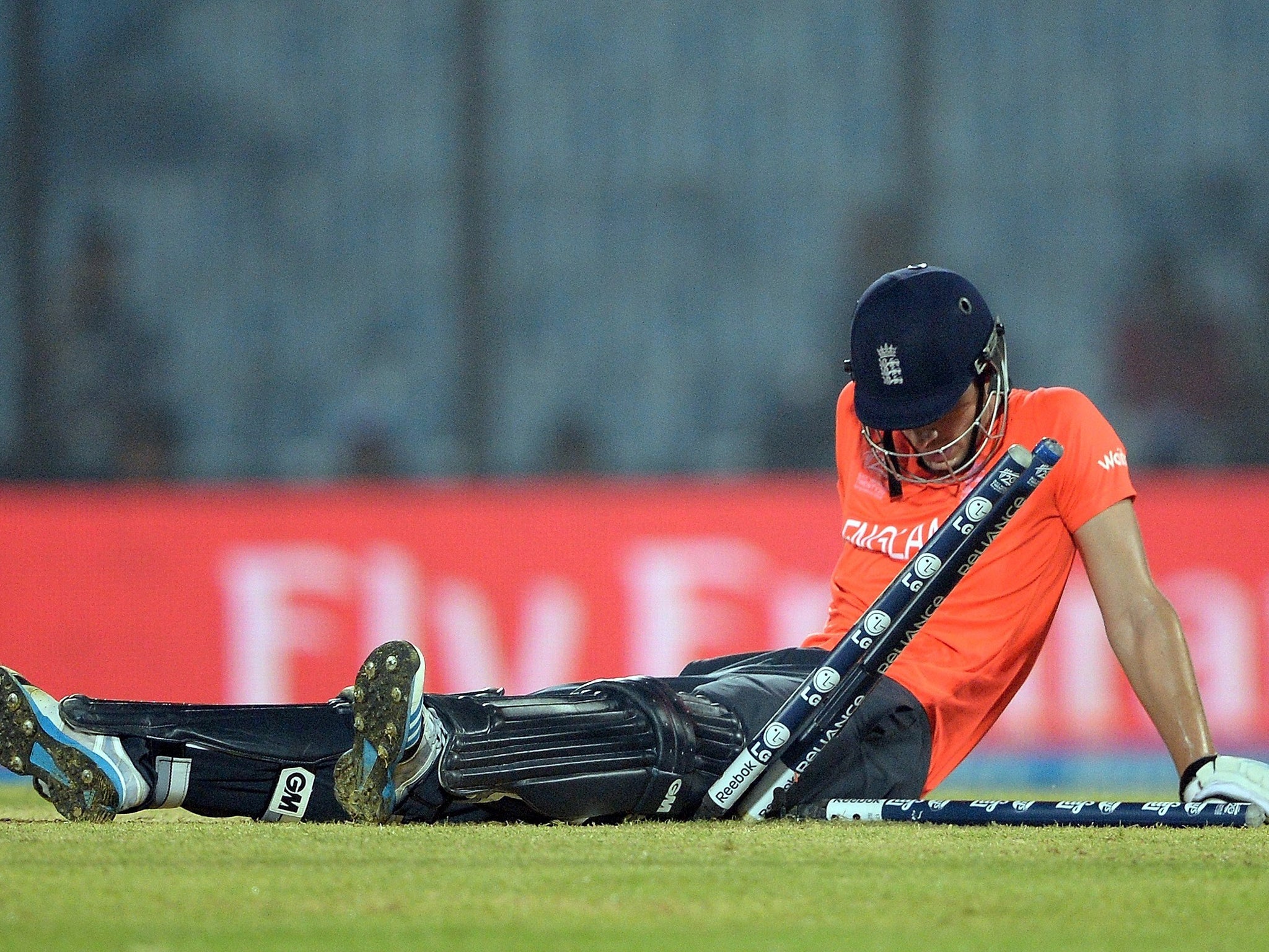 Alex Hales reacts after colliding with the stumps during England's three-run defeat to South Africa in the World Twenty20
