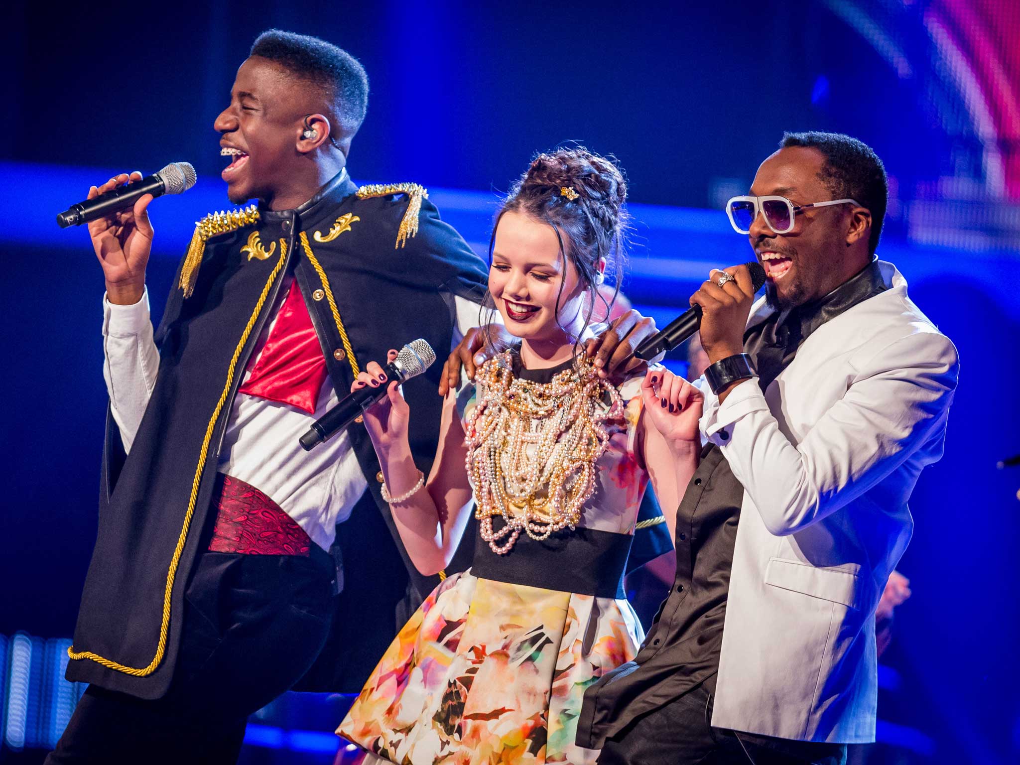 Will.i.am singing with Jermaine Jackman and Sophie May Williams