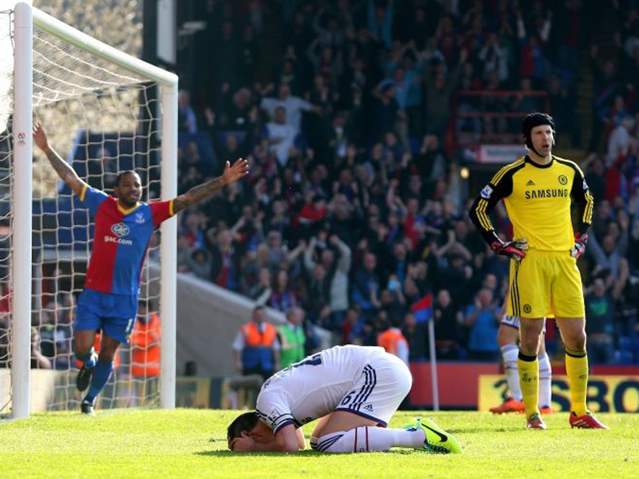 A dejected John Terry reacts after opening the scoring with an own goal