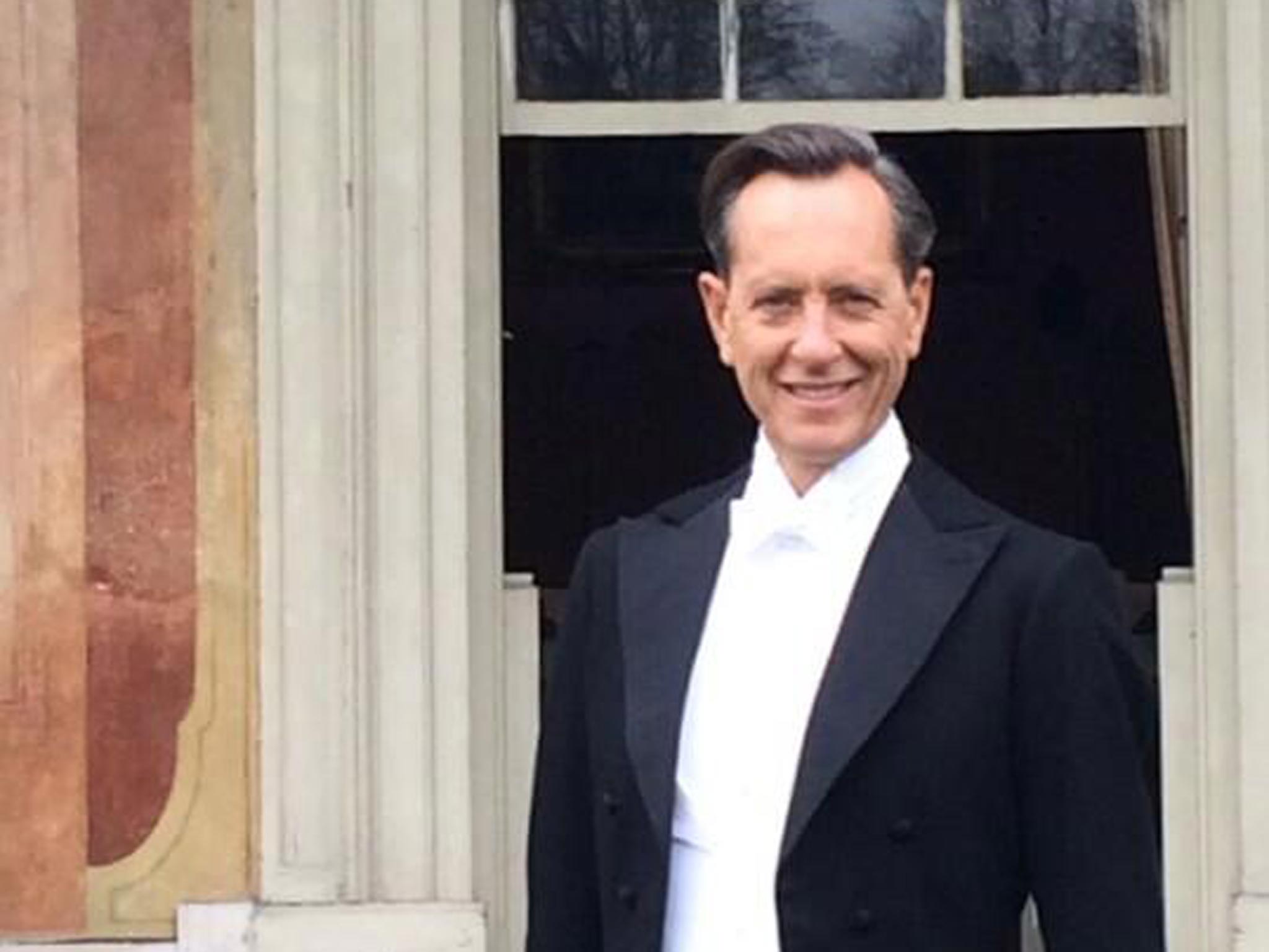 Suited and booted: Richard E Grant on the set of Downton Abbey