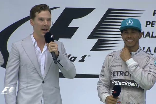 Sherlock star Benedict Cumberbatch interviews Lewis Hamilton on the podium following the Mercedes driver's Malaysian GP victory