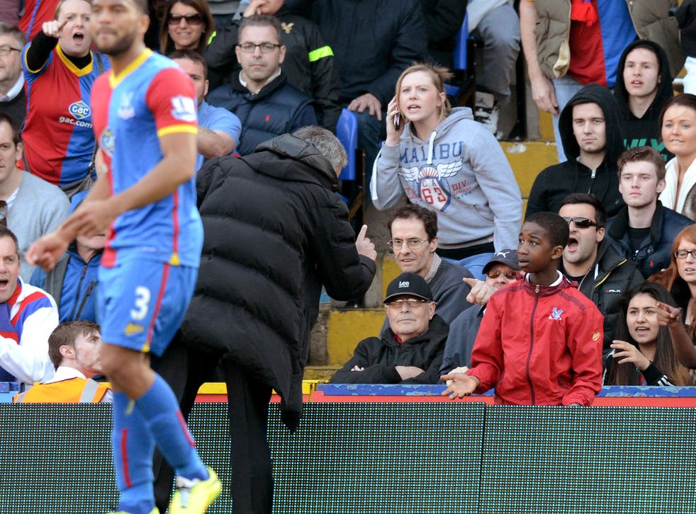 Jose Mourinho the Chelsea manager argues with a Crystal Palace ball boy during Chelsea's 1-0 defeat at Selhurst Park