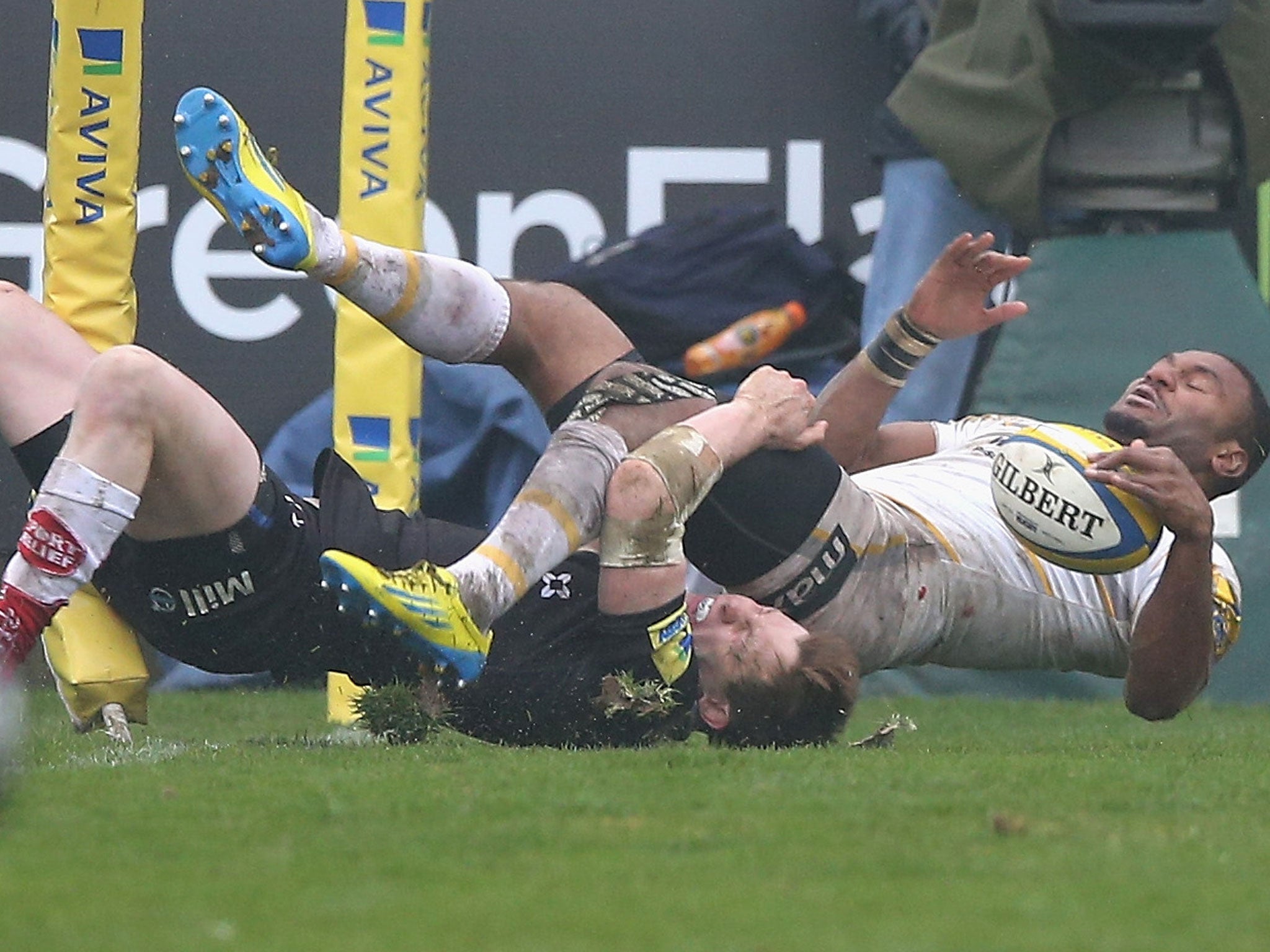 Josh Drauniniu is turned over after scoring the match-winning try for Worcester at Newcastle