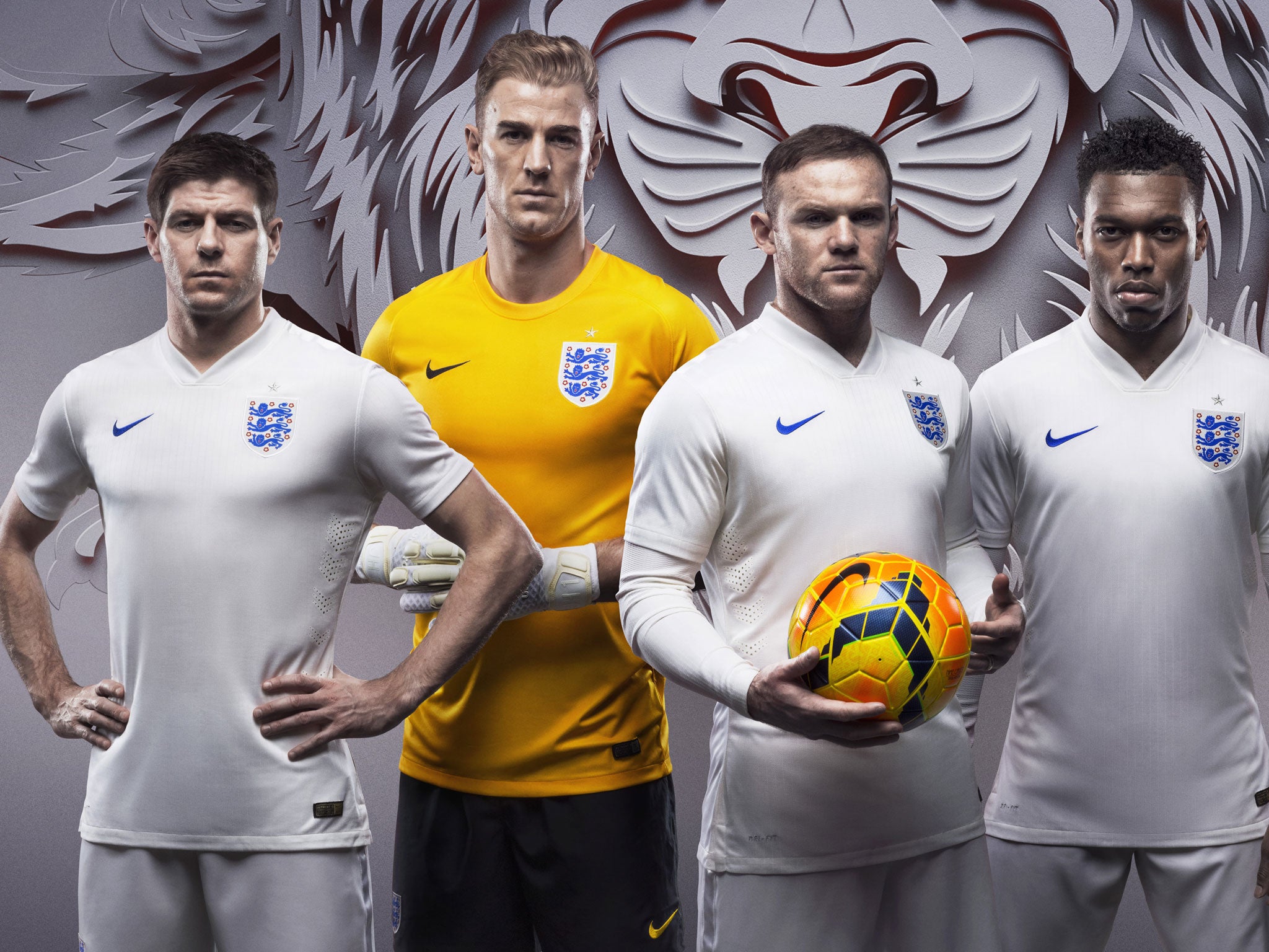 Right to left: Steven Gerrard, Joe Hart, Wayne Rooney and Daniel Sturridge unveil the home shirt