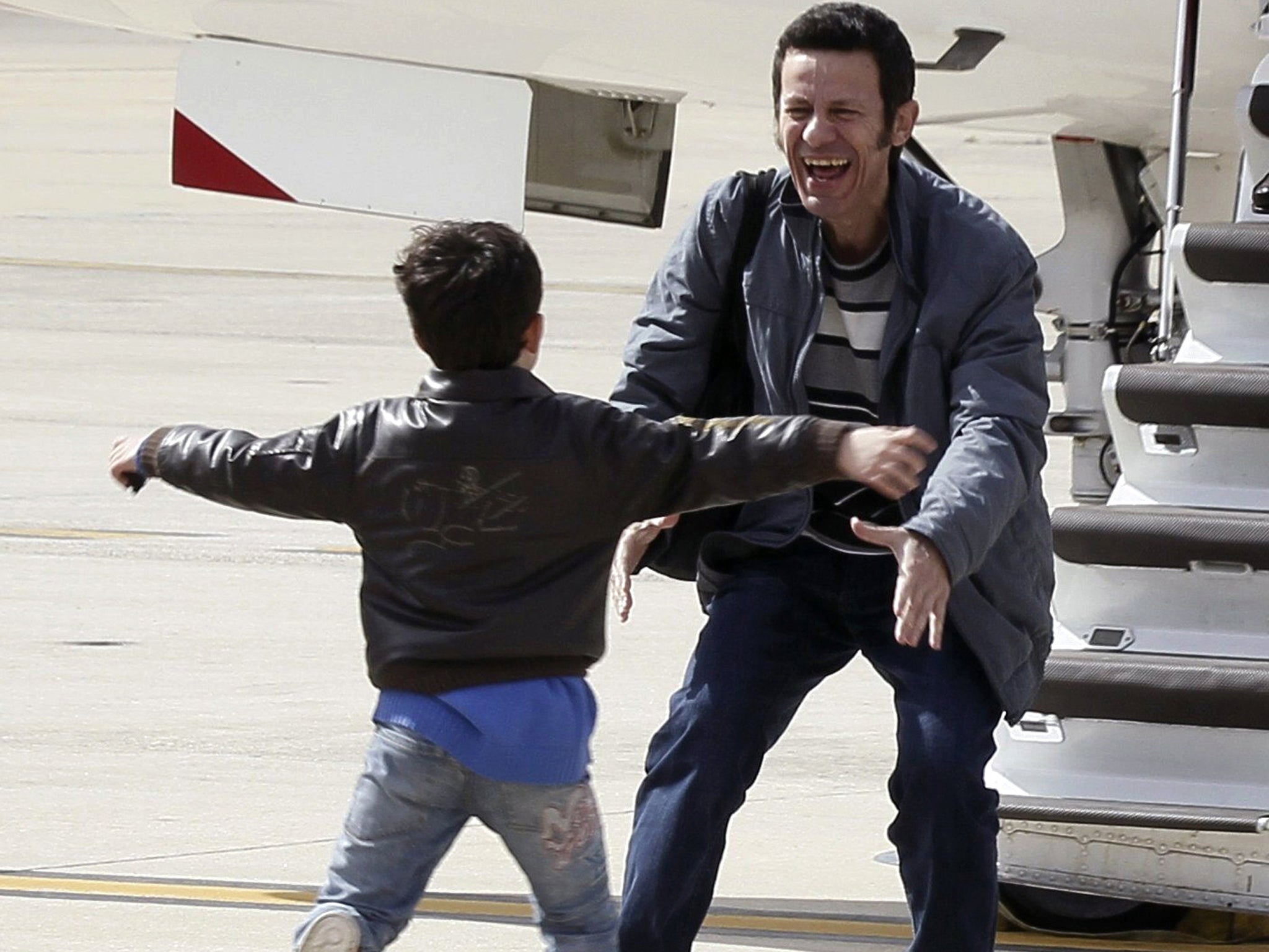 Dad’s home at last: the moment of pure joy yesterday when Spanish journalist Javier Espinosa was reunited with his son after being held hostage in Syria for six months