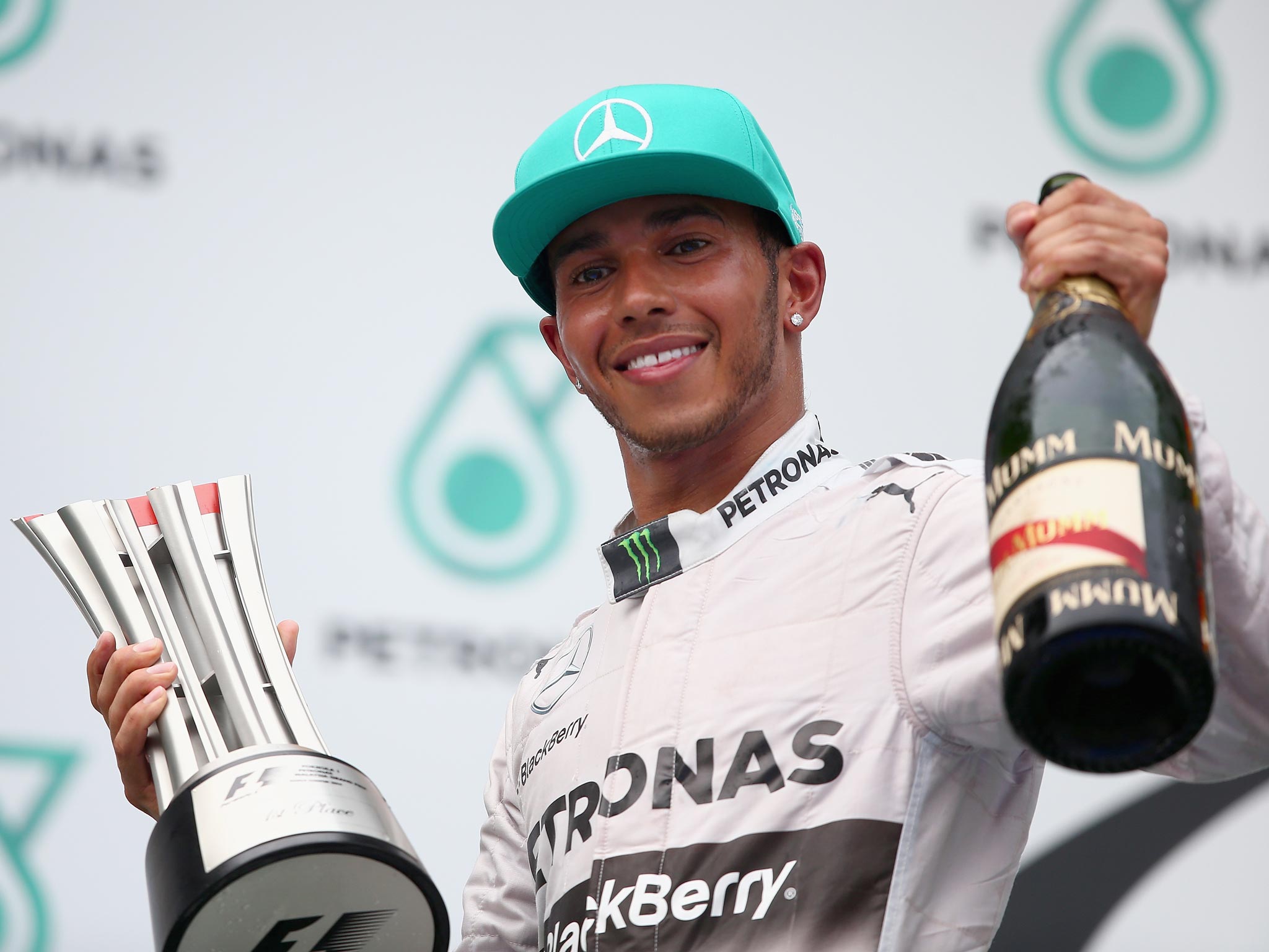 Lewis Hamilton was left 'really happy' to seize the Malaysian Grand Prix with both hands