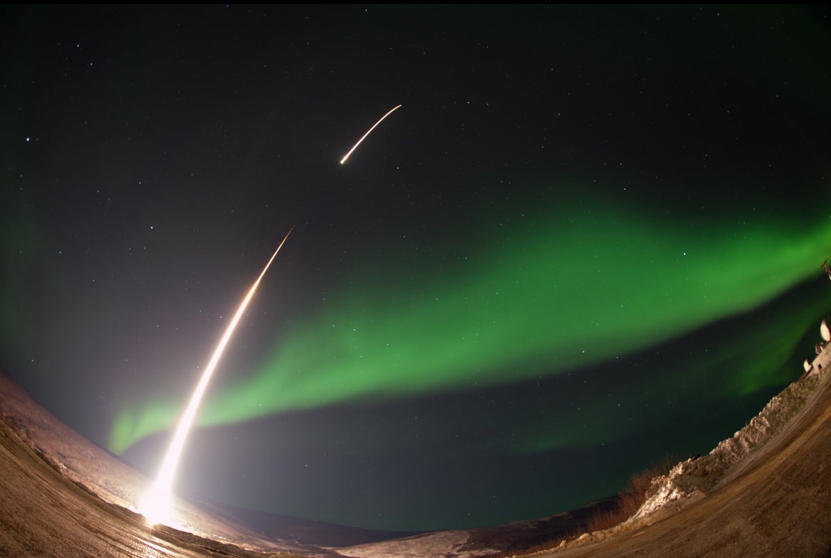 The rocket launches straight into an aurora over Venetie, Alaska