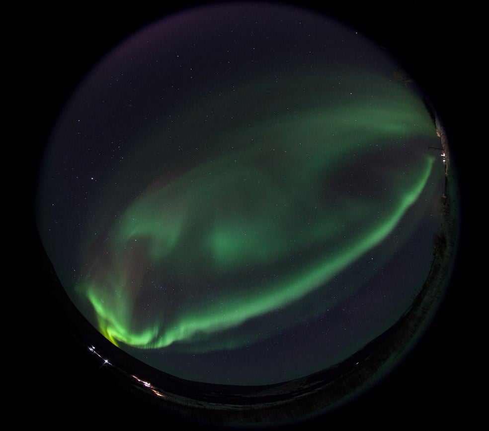Auroras are created when particles from the sun bombard the Earth