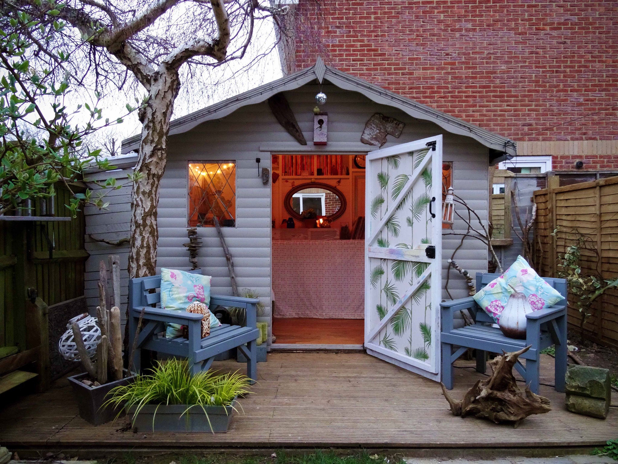 A shed painted to look like a beach retreat