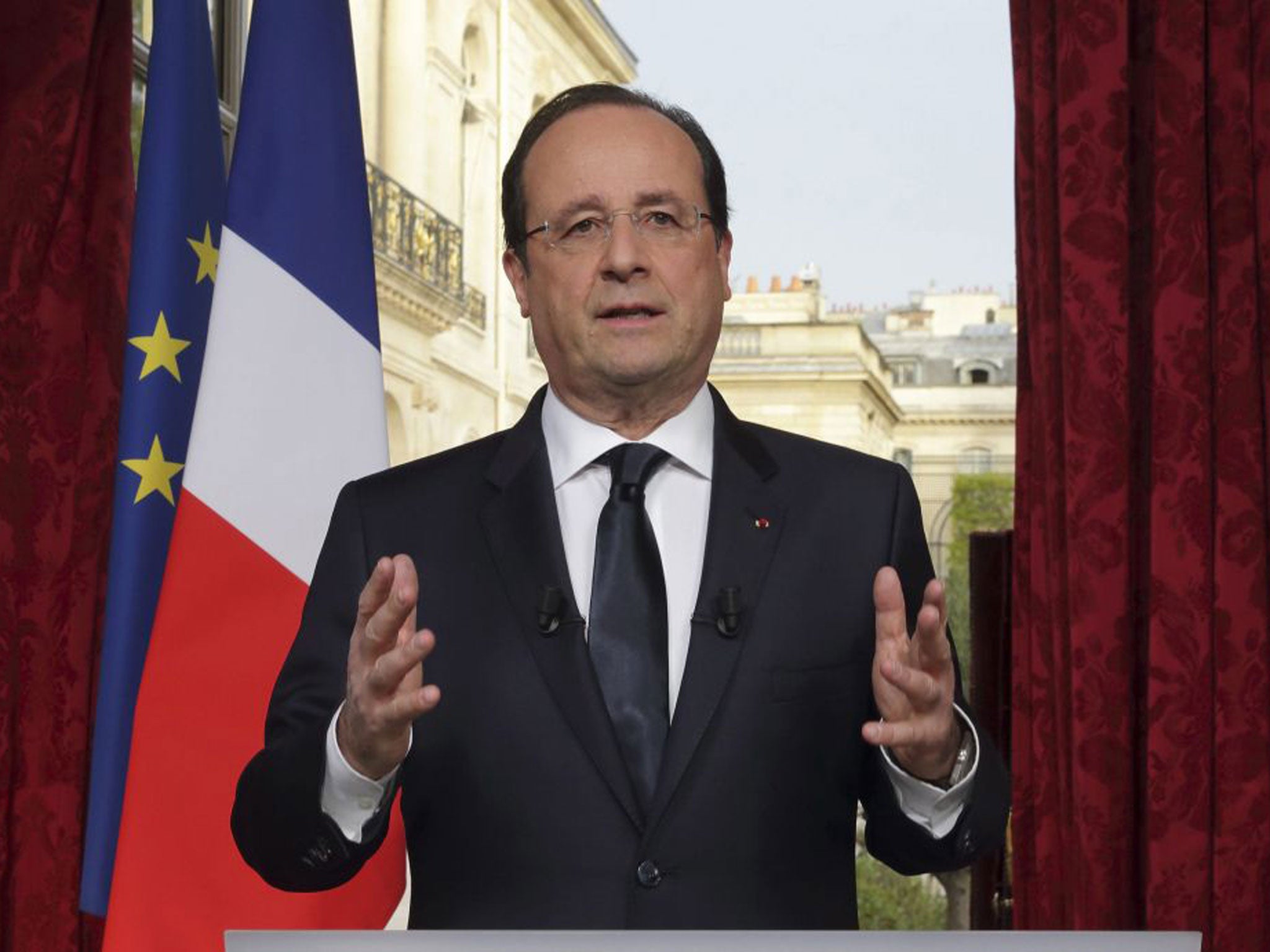 François Hollande addresses the nation from the Elysée Palace last night
