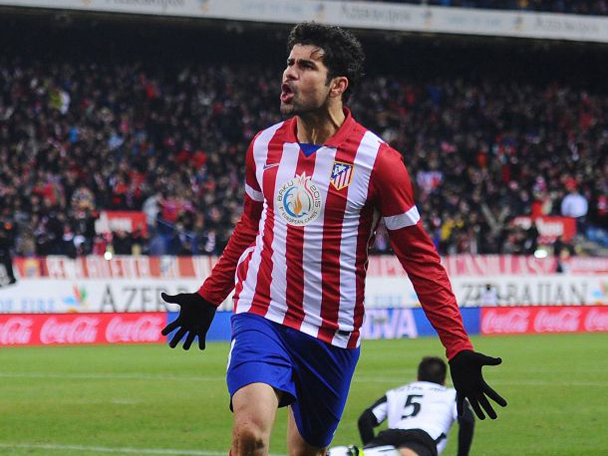 Diego Costa celebrates scoring for Spain’s league leaders Atletico Madrid