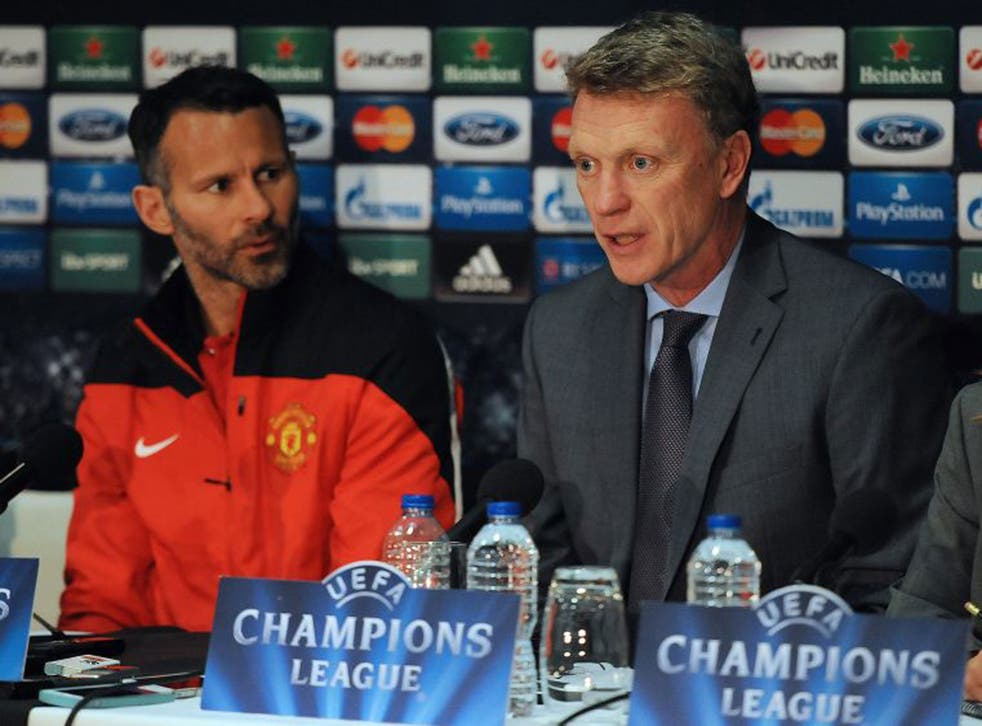 Ryan Giggs and David Moyes attempt to present a united front
to the press yesterday
