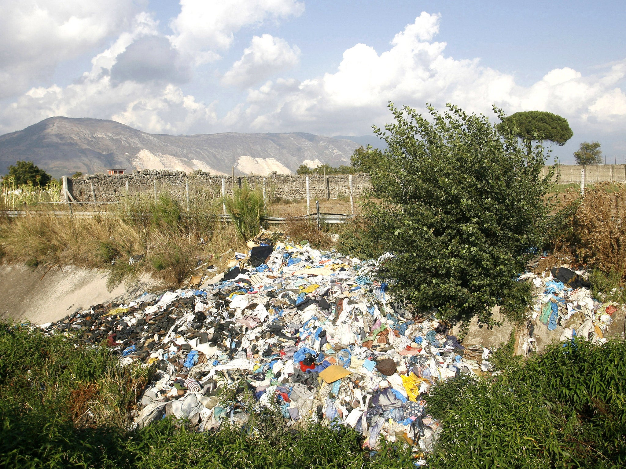 Uncollected rubbish sits on the Regi Lagni Canals in Marigliano