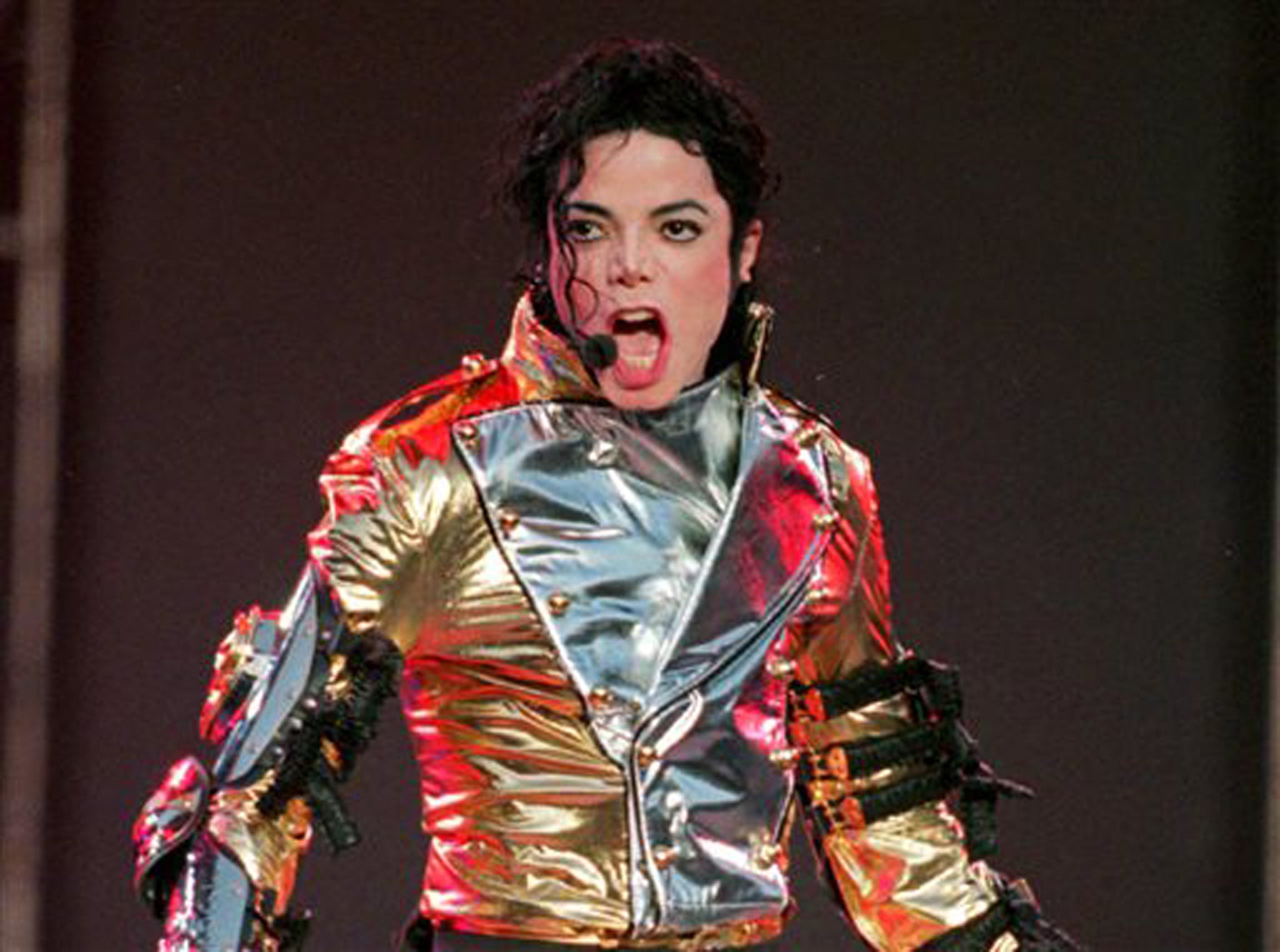 The pop star performs during his "HIStory Tour Part II" tour in 1997
