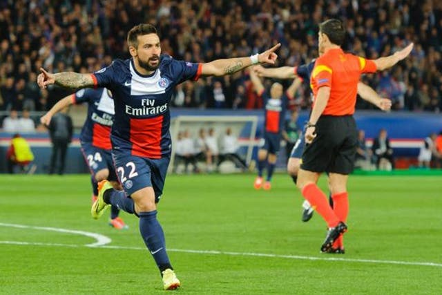 Ezequiel Lavezzi of PSG celebrates after scoring the opening goal during the UEFA Champions League match between Paris Saint Germain and Chelsea in Paris, France