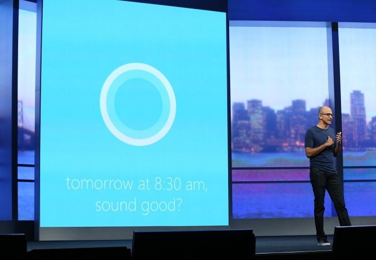 Microsoft CEO Satya Nadella introduces Cortana, which appears as an animated circle.